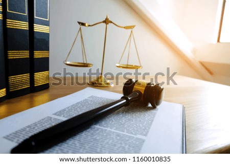 Close up object  law concept. Judge gavel with justice lawyers and documents working on table.