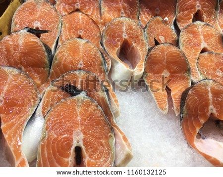Salmon fillets at fish store.