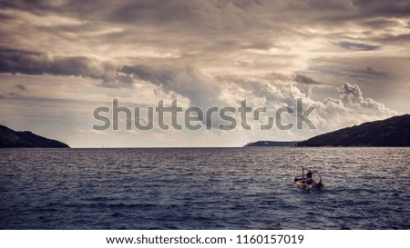 Mediterranean sea and small fishing boat