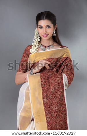 beautiful charming Indian woman in traditional attire 