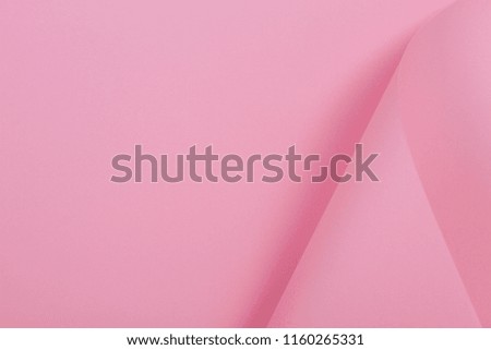 Abstract geometric shape pink color paper background