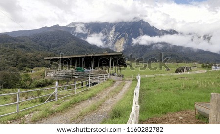 View of Mount Kinabalu on cloudy day. Located in Sabah, Malaysia.