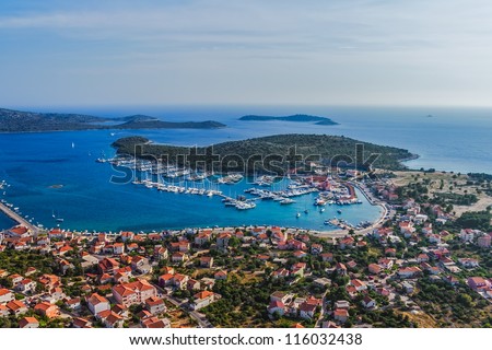 Aerial helicopter photo of marina with boats and sailboats, Adriatic tourist destination Rogoznica, Croatia