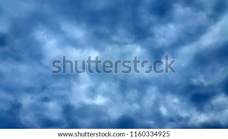 Stormy sky. Dark storm clouds. Natural background for greeting card. Banner. Photo of storm clouds