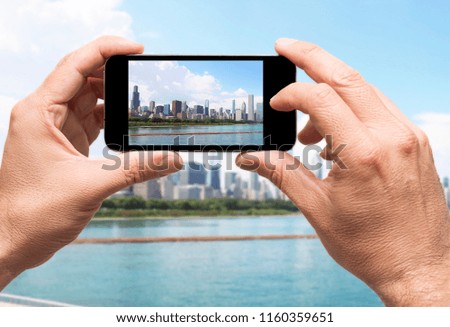Chicago city, taking picture with smart phone, travel concept