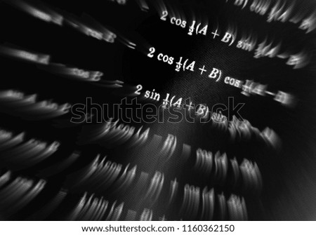 Large number of mathematical formulas focus zoom on a black background