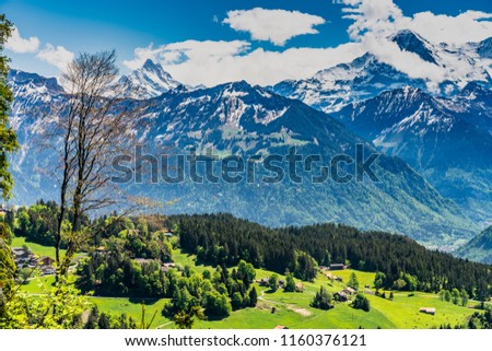 Switzerland, Beatenberg panoramic view on snow alps and lake