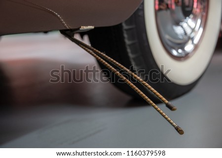 Curb feelers protecting whitewall tiers Royalty-Free Stock Photo #1160379598