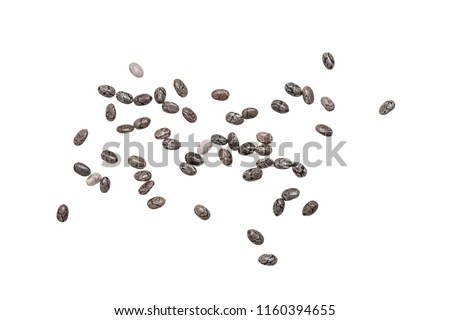 Close up of small group of chia seeds spread out and isolated on white background Royalty-Free Stock Photo #1160394655