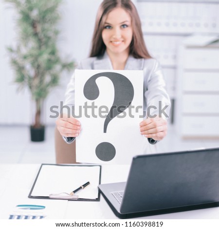 young business woman showing a question mark,