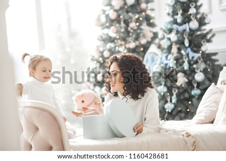 Cheerful family near the Christmas tree