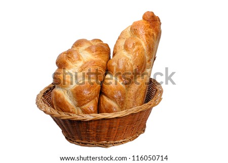two loaves of freshly  bread in a basket