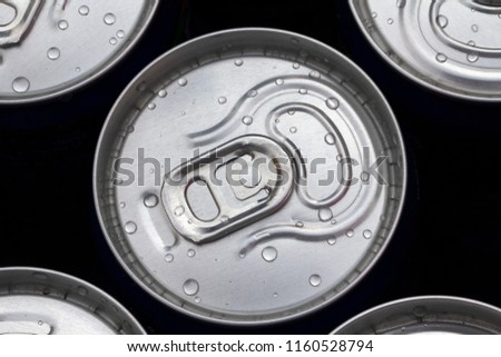 Pattern repeating of beer cans in alcohol and beverage department of superstore