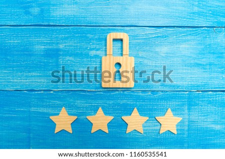 Wooden padlocks and four stars. Security, security of users and business. Internet security, antivirus, data protection. Alarms of home, car and business. The concept of property protection.