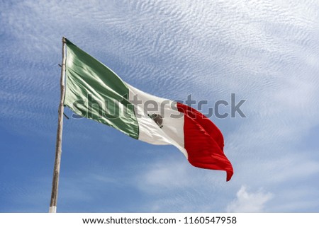 Mexican flag and blue sky