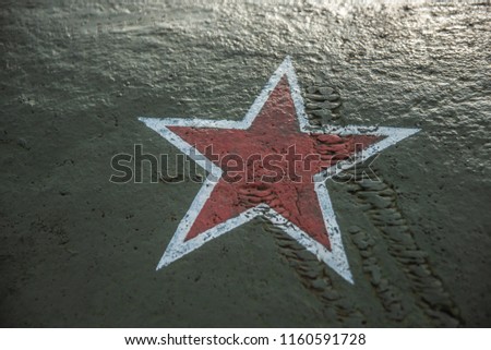 Army military star on green metal close up for the designer