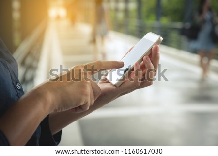 Close up of a women using mobile smart phone.online shopping concept