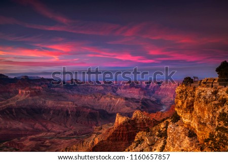 Vibrant sunset over one of the overlooks at Grand Canyon National Park Royalty-Free Stock Photo #1160657857