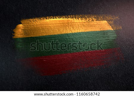 Lithuania Flag Made of Metallic Brush Paint on Grunge Dark Wall