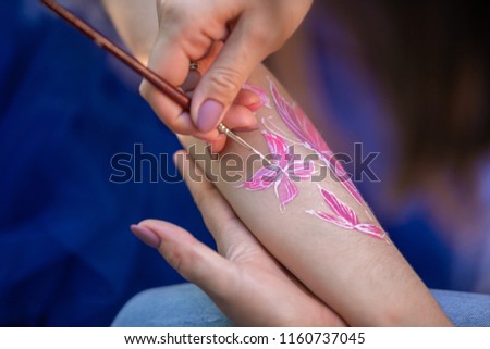 child body art. pictures on arm