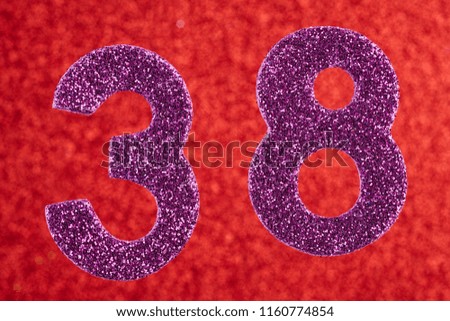 Number thirty-eight purple color over a red background. Anniversary. Horizontal