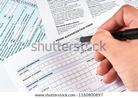 Human fill a prior authorization form Royalty-Free Stock Photo #1160800897