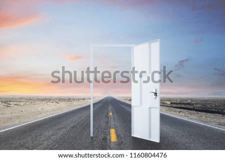 Open door on road and sky background. Opportunity and path concept 
