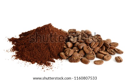 Ground coffee and coffee beans isolated on white background. Close-up with full dept of field