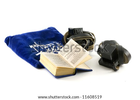 Tefillin - phylacteries worn by Jewish men for morning prayers, Siddur - Jewish prayerbook and bag isolated on white Royalty-Free Stock Photo #11608519