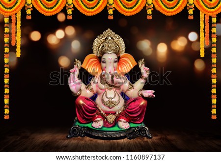 Ganpati, Lord Ganesh with Festival background Royalty-Free Stock Photo #1160897137