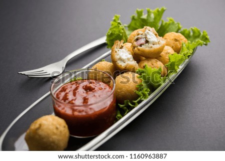 Dahi Ke Angare also known as Kabab or kebab is a popular snack item from India / Pakistan. served with green and red sauce. Selective focus
