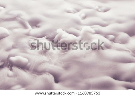 Abstract background of clouds made of smoke from dry ice in color pink
