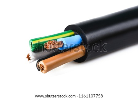 Electrical power cable on white background. Copper wire is the electric conductor of urban society. Royalty-Free Stock Photo #1161107758