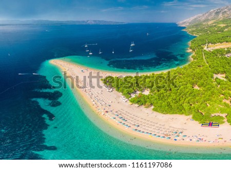 Famous Zlatni rat beach in Bol, Island Brac, Croatia, Europe Royalty-Free Stock Photo #1161197086