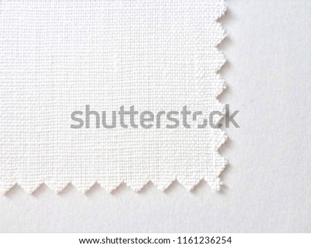 zigzag line. white natural background. fabric cloth texture. zigzag the edge of the fabric