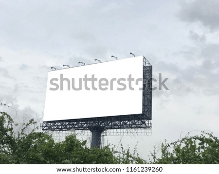 Blank billboard on blue sky background for new advertisement