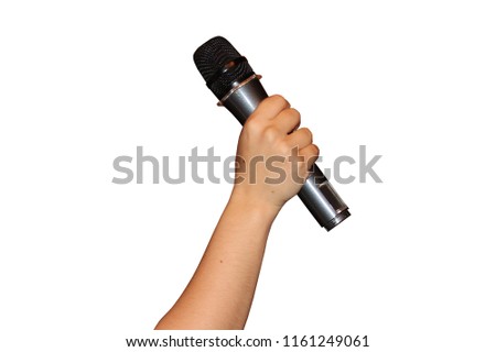Microphone in beautiful hand. Working tool of journalist. Mic for karaoke.