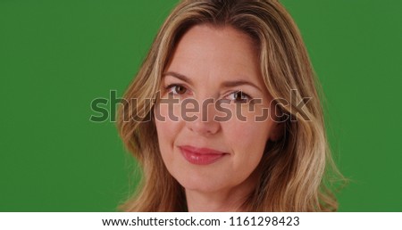 Close up of charming middle aged white woman on green screen