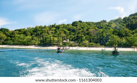 Banana beach on Coral (Koh He) island on a sunny day, Phuket, Thailand. The picture aspect ratio is 16:9 