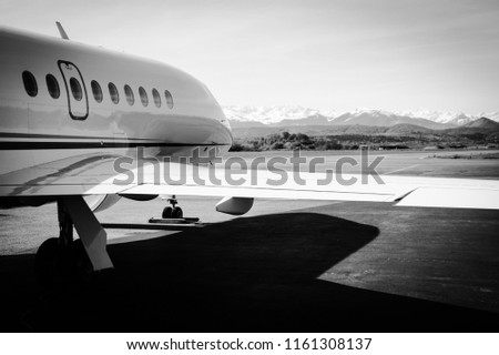 Business Jet with open door waiting for passengers