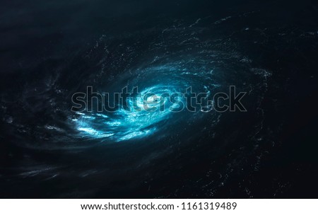 Blue cold galaxy, cluster of stars in deep space. Science fiction art. Elements of this image furnished by NASA
