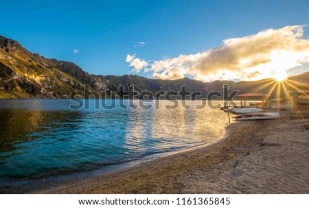 Sunrise in Quilotoa lake Royalty-Free Stock Photo #1161365845