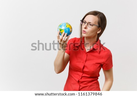 Portrait of business or teacher woman in red shirt holding in palms Earth globe isolated on white background. Problem of environmental pollution. Stop nature garbage, environment protection concept