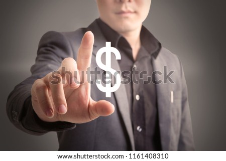 Business Man pushing on dollar icon on gray background,business concept.