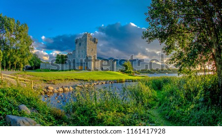 Idyllic landscape of Ross Castle in the Killarney National Park in Ireland. Travel by car through the Ring of Kerry. Royalty-Free Stock Photo #1161417928