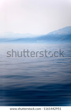 Smoky and foggy water surface of Lake Tahoe, California due to forest fires