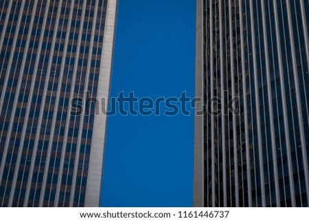Beautiful outdoor view of two huge buildings in a gorgoues sunny day and blue sky background, located in Downtown LA Los Angeles skyline cityscape California