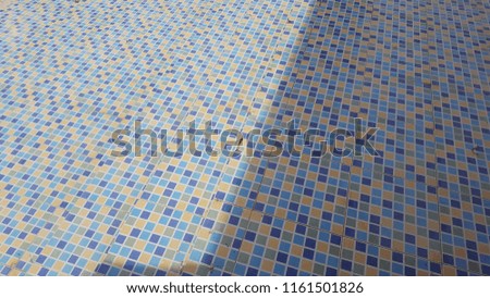 Shadow on tile floor