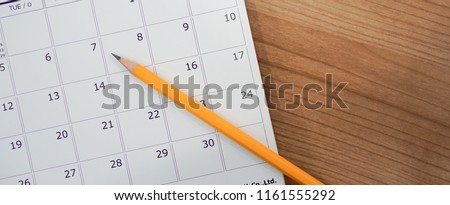 close up soft focus on pen over calendar 2018 at office desk with top view concept
