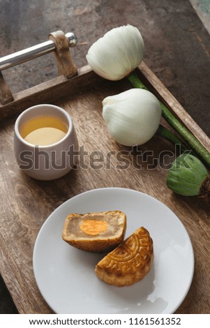 Moon cakes are offered to friends or on family gathering during the mid-autumn festiva. Mooncake and tea 